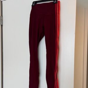 Lululemon Burgundy Leggings with Stripes on one leg